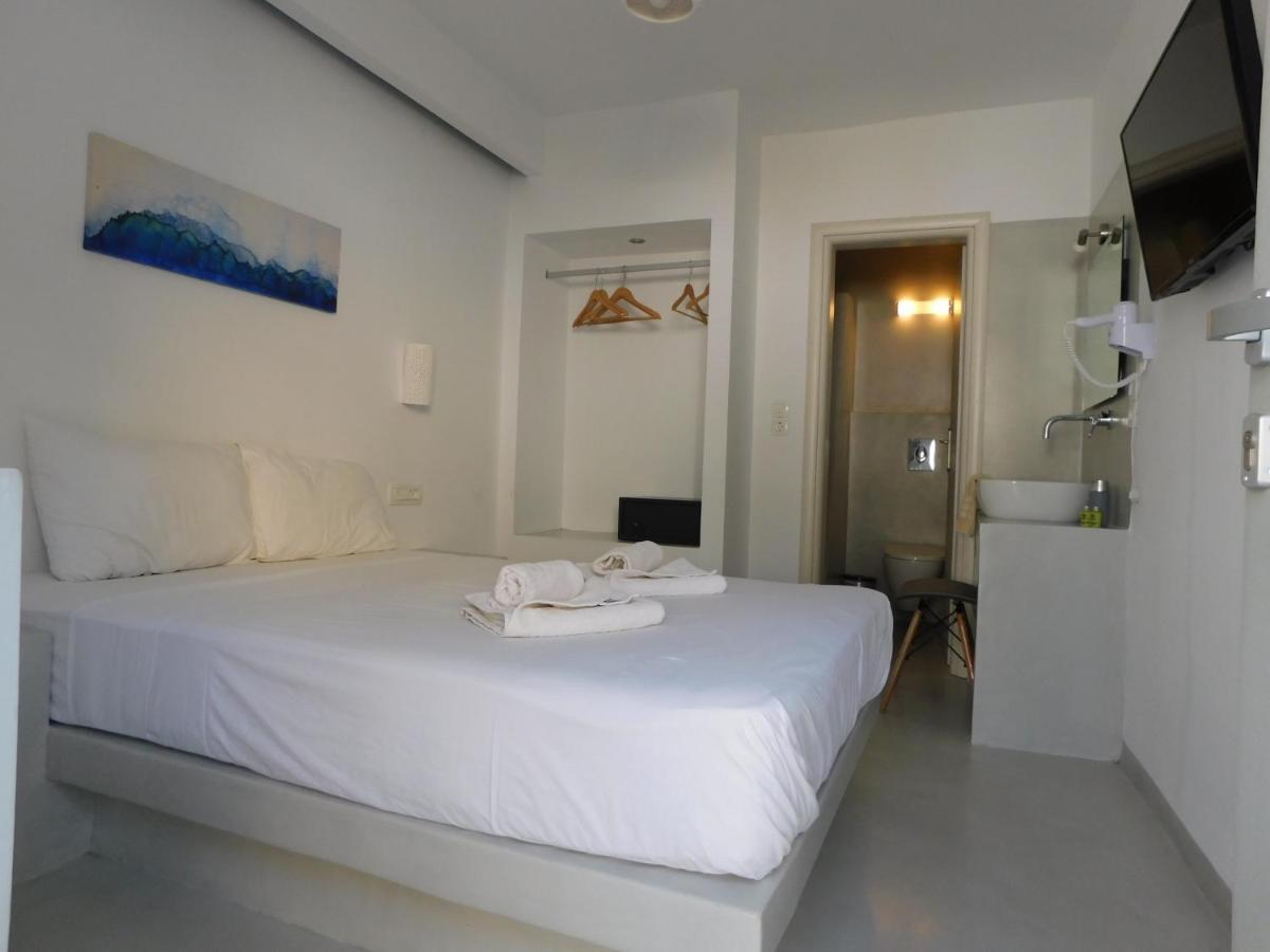 Fira Getaway - Economy Basement Rooms Bagian luar foto