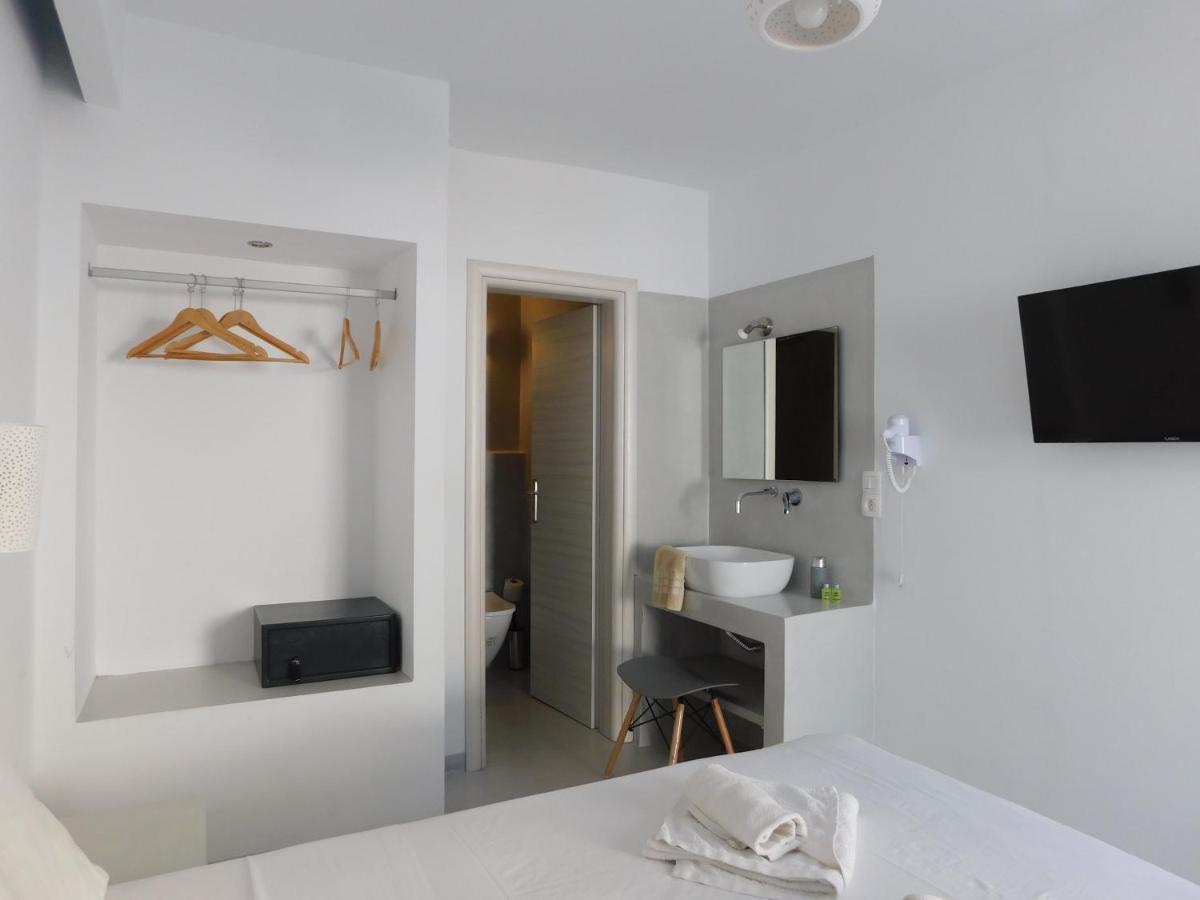 Fira Getaway - Economy Basement Rooms Bagian luar foto